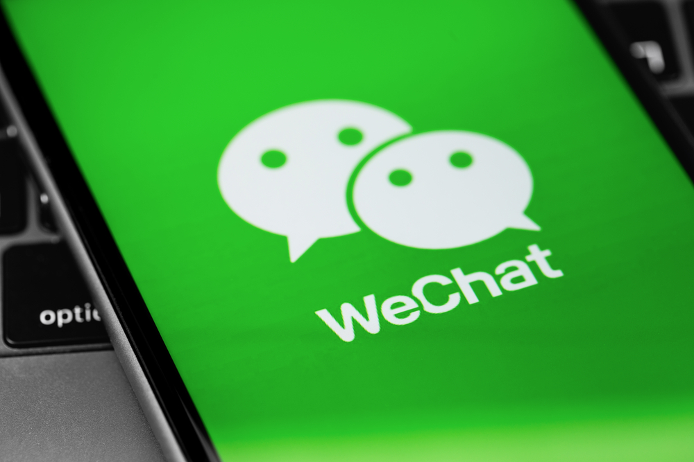 WeChat app on the screen smartphone closeup. WeChat is a mobile